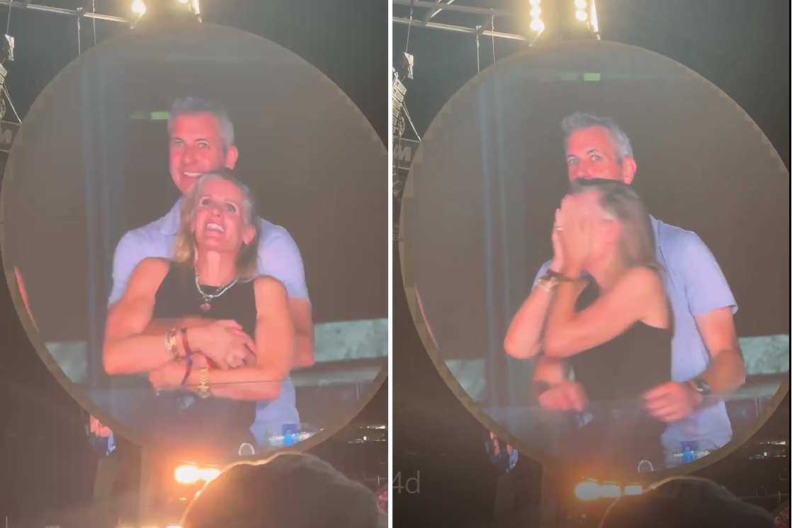 Astronomer首席执行官(CEO)安迪·拜伦搂抱公司人力资源总监(HR)克里斯汀·卡伯特 图源:美媒